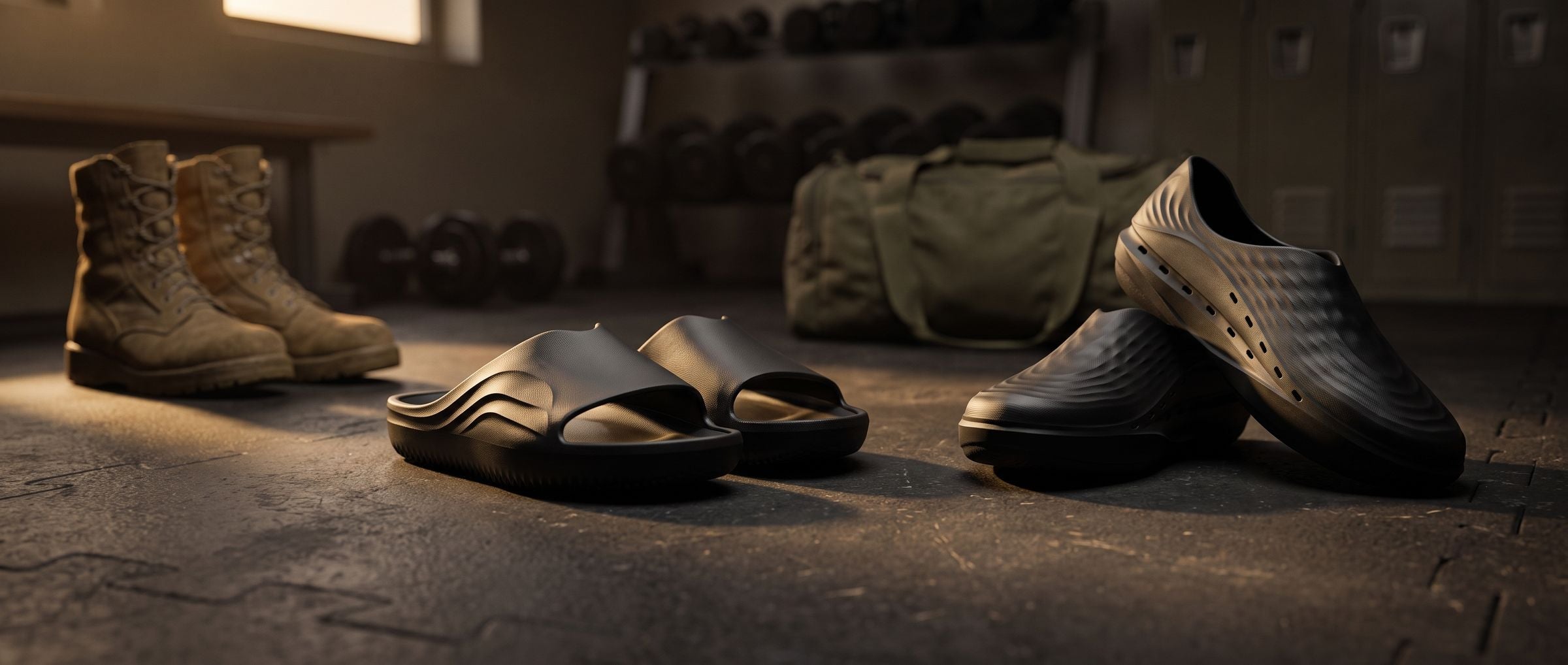 STAND+ AG3 Recovery Slides and AntiGrav shoes beside service boots and a duffel in a locker room